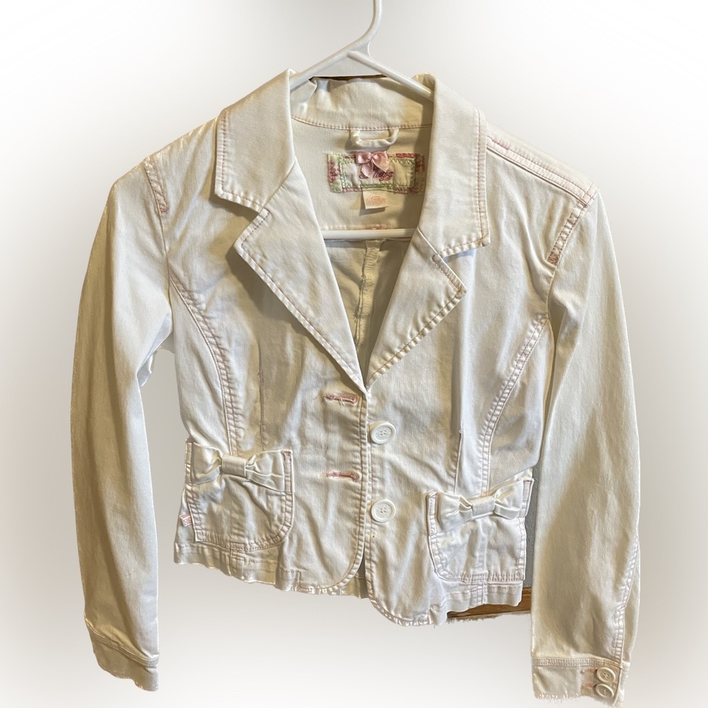 White jacket with pink stitching. Size small.